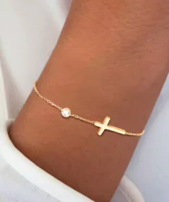 Pulsera cruz dorada Célia