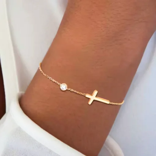 Pulsera cruz dorada Célia