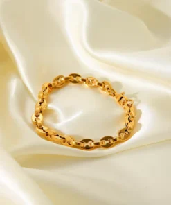 Pulsera de mujer dorada con eslabones grano de café