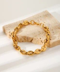 Pulsera de mujer dorada con eslabones grano de café