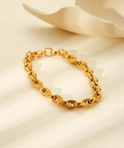 Pulsera de mujer dorada con eslabones grano de café
