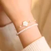 Pulsera flor con perla Rosy